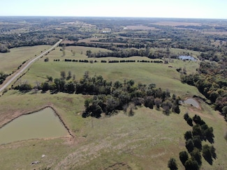X Highway V, Milan, MO 63556