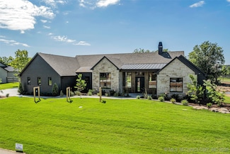 17624 E White Tail Cove, Owasso, OK 74055