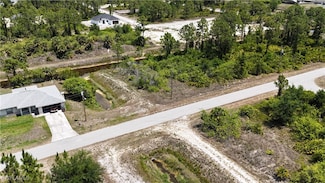 1037 Kellogg St E, Lehigh Acres, FL 33974