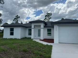 322 Mcarthur Blvd, Lehigh Acres, FL 33974