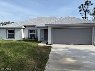 403 Tremaine St, Lehigh Acres, FL 33972