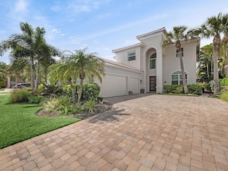 103 Via Escobar Place, Palm Beach Gardens, FL 33418