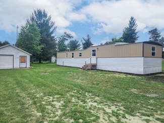 630 N Bass Lake Rd, Harrison, MI 48625
