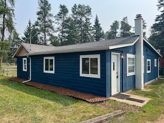 3942 Woods Rd, Harrison, MI 48625