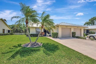 7707 SE Sugar Sand Cir, Hobe Sound, FL 33455