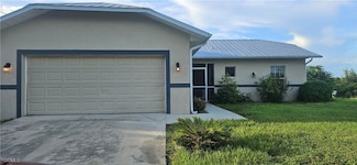 1111 Estate St E, Lehigh Acres, FL 33974