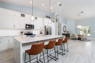 1511 Whispering Oaks Cir, Naples, FL 34110