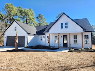 153 Boundaryline Dr NW, Calabash, NC 28467