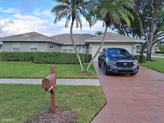 10561 Greentrail Dr S, Boynton Beach, FL 33436