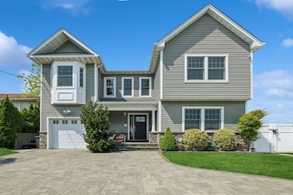 26 Island Pkwy N, Island Park, NY 11558