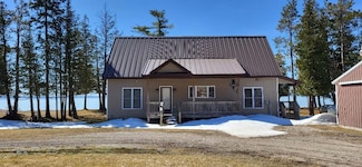 195 W Huron Dr, Pointe Aux Pins, MI 49775
