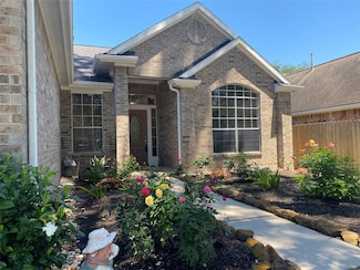 1727 Whispering Forest Dr, Kingwood, TX 77339