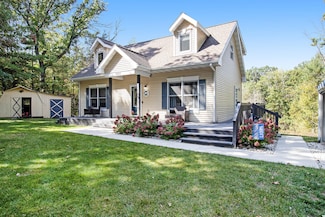 8595 Gatewood Rd, Howard City, MI 49329