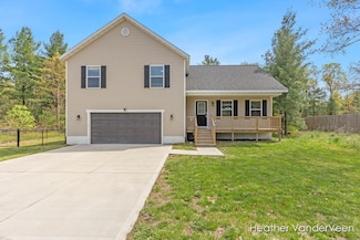 469 Ramona St, Twin Lake, MI 49457