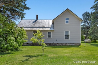 3119 S Hillman Rd, Sidney, MI 48885