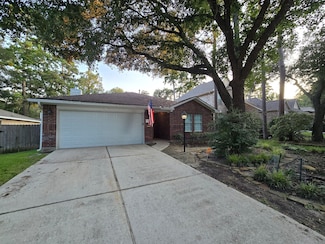 15 Windswept Oaks Place, Conroe, TX 77385