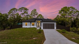 1042 Bassinger Ave S, Lehigh Acres, FL 33974