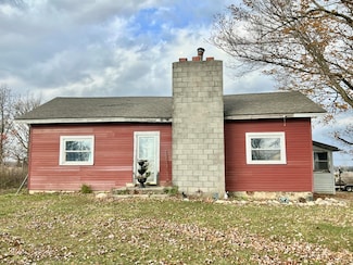 3240 Reading Rd E, Osseo, MI 49266
