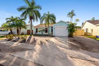 104 Greenbriar Dr, Jupiter, FL 33458