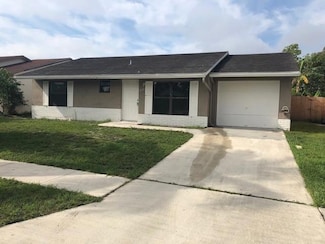 5862 Triphammer Rd, Lake Worth, FL 33463