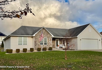 406 School Side Dr, Throop, PA 18512