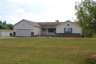 9674 Fairwinds Ct, Alto, MI 49302
