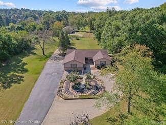 766 White House Dr, Highland, MI 48356