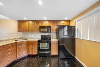 6075 N Sabal Palm Blvd Unit 210D, Tamarac, FL 33319