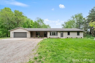 11410 Long Lake Dr NW, Sparta, MI 49345