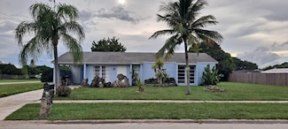 201 NE Solida Cir, Port Saint Lucie, FL 34983