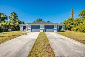 108/110 Gretchen Ave S, Lehigh Acres, FL 33973