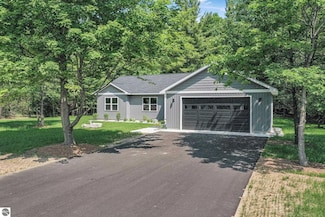 6483 Jeffrey Place, Grawn, MI 49637