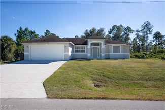 1148 Dutchess St E, Lehigh Acres, FL 33974
