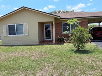 9802 NW 71st St, Tamarac, FL 33321
