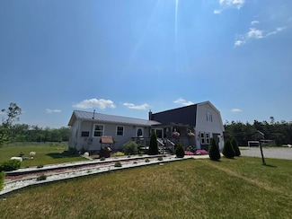 1300 N Perry Creek Rd, Fairview, MI 48621