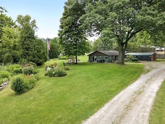 486 W Woodland Dr, Sanford, MI 48657