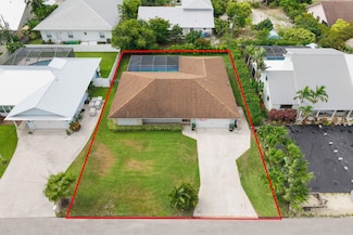 5647 SE Sailfish Way, Stuart, FL 34997