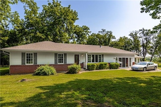 704 E White Rd, Oak Grove, MO 64075