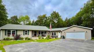 10400 Woodwind Dr, Interlochen, MI 49643