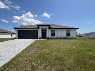 448 Burrstone Dr, Lehigh Acres, FL 33936