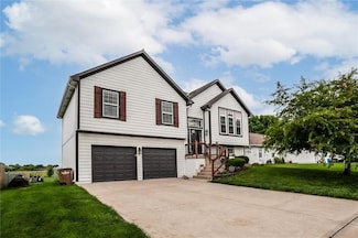 706 S Sunset Ln, Raymore, MO 64083