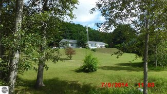 2394 Valley Rd, Honor, MI 49640