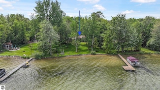 7786 N Shore Ct, Grawn, MI 49637