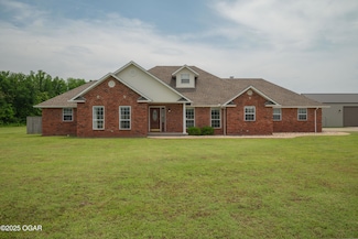 201 S Canary Ln, Commerce, OK 74339