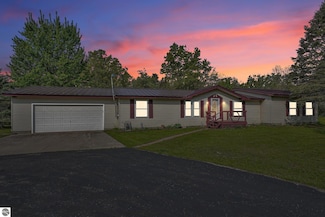 2439 W 10 1 2 Mile Rd, Irons, MI 49644