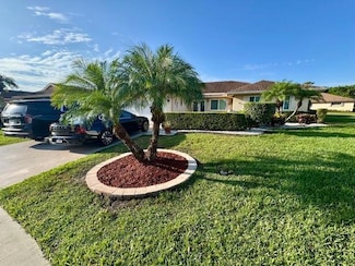 10668 Greentrail Dr S, Boynton Beach, FL 33436