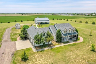 56920 E 42nd Ct, Strasburg, CO 80136