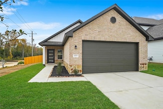 11703 Eclipse Dr, Willis, TX 77318