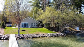10701 SW Torch Lake Dr, Rapid City, MI 49676