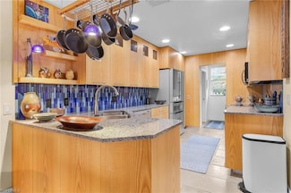 5677 Cove Cir, Naples, FL 34119